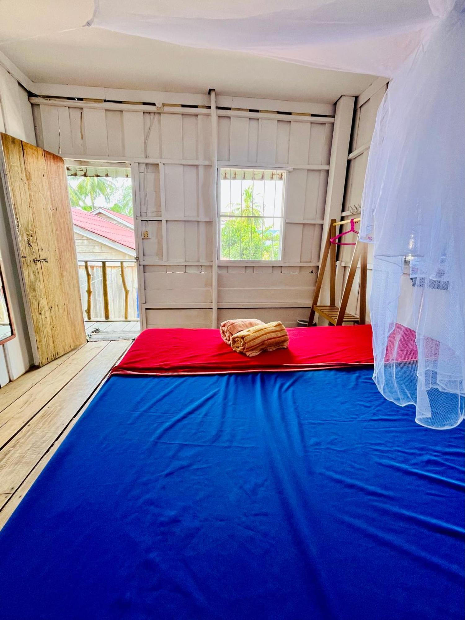 Happiness Guesthouse Ронгсанлем Экстерьер фото